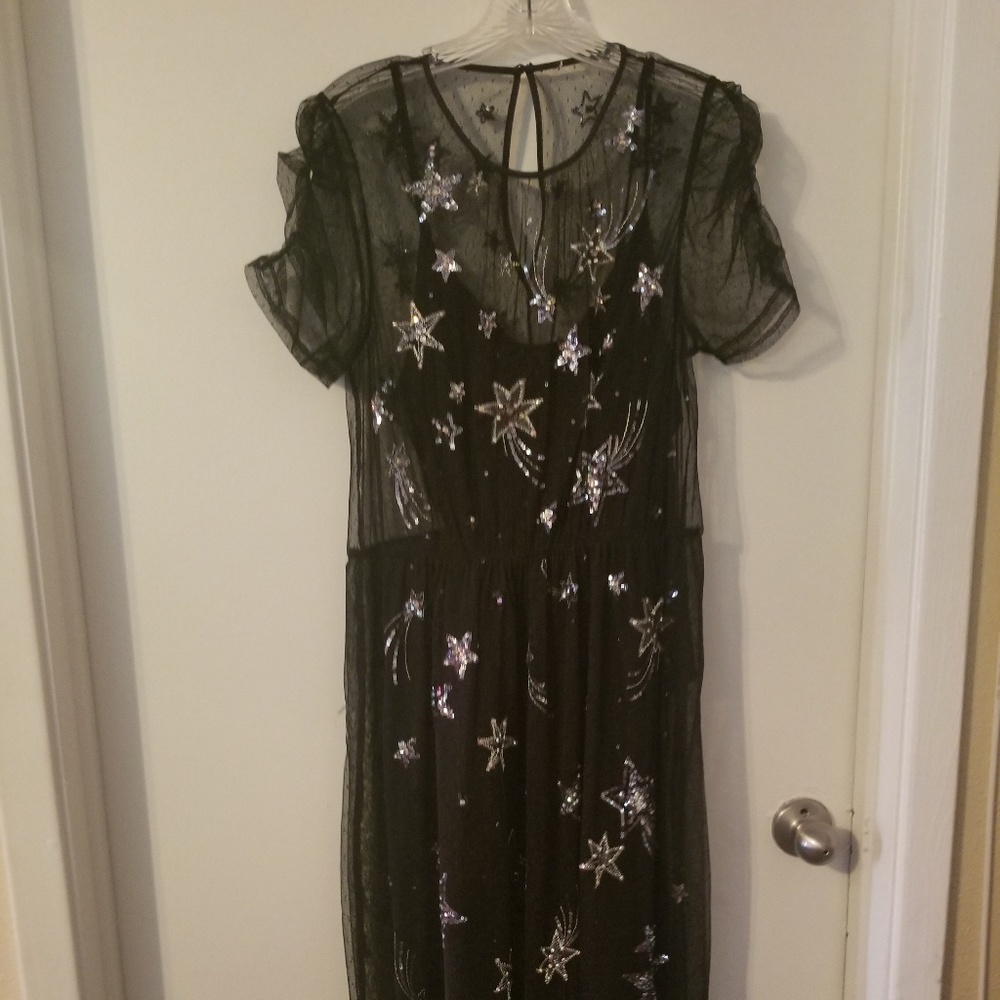 Sheer dress with embroidered silver stars